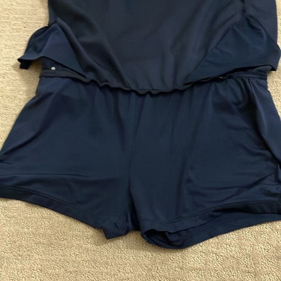 Great Greg Norman navy skort with navy and silver braid around waistband. - Picture 7 of 15